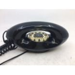 A vintage black telephone