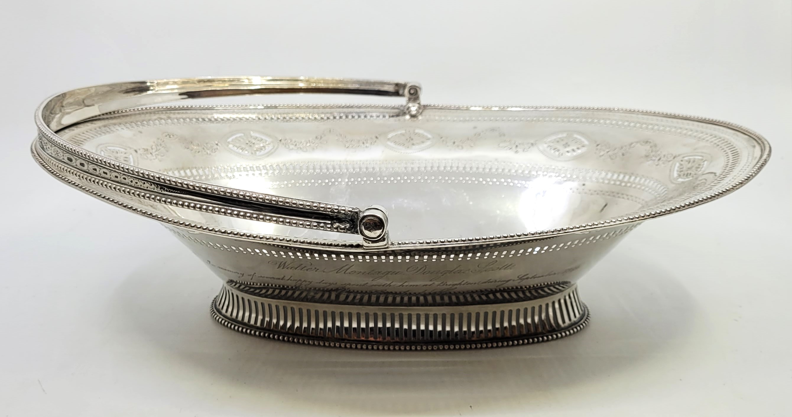 A George III silver swing handled basket, Robert Hennell I, London 1793, of ovoid form, the out - Image 3 of 21