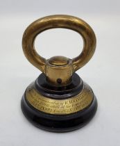 Royal Navy interest: A brass paperweight with applied inscribed plaque "From the Captain's Cabin