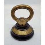 Royal Navy interest: A brass paperweight with applied inscribed plaque "From the Captain's Cabin