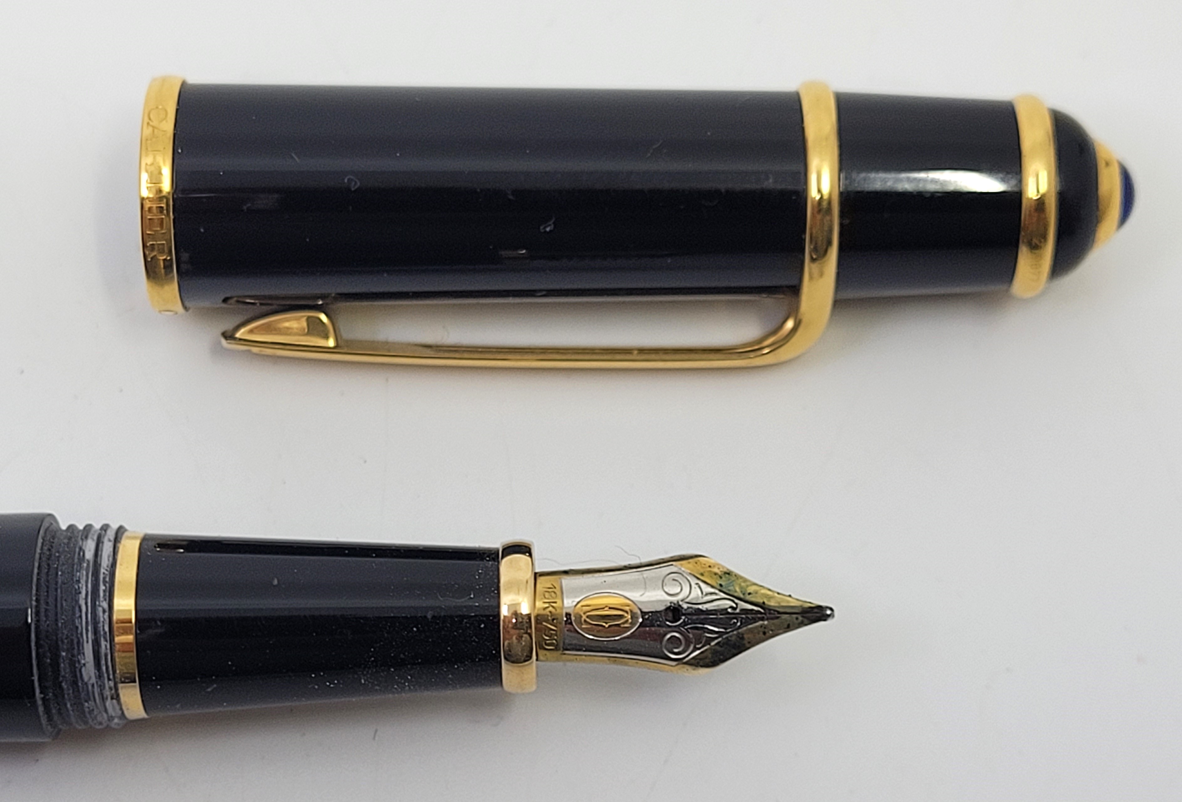 A Cartier "Diablo de Cartier" black composite fountain pen, with 18ct. gold nib, with paperwork in - Image 8 of 9