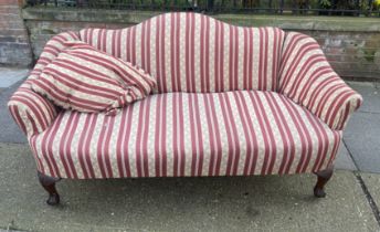 A large early 20th century sofa later upholstery raised on original brass castors