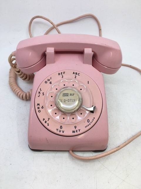 A vintage pink bell telephone (WESTERN ELECTRIC) (C/D, 500, 1-59)