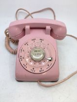 A vintage pink bell telephone (WESTERN ELECTRIC) (C/D, 500, 1-59)
