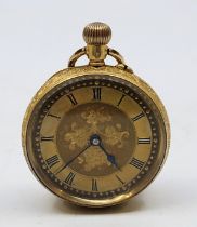 An 18ct. gold ladies fob watch, crown wind, having gold Roman numeral dial with blued spade and whip