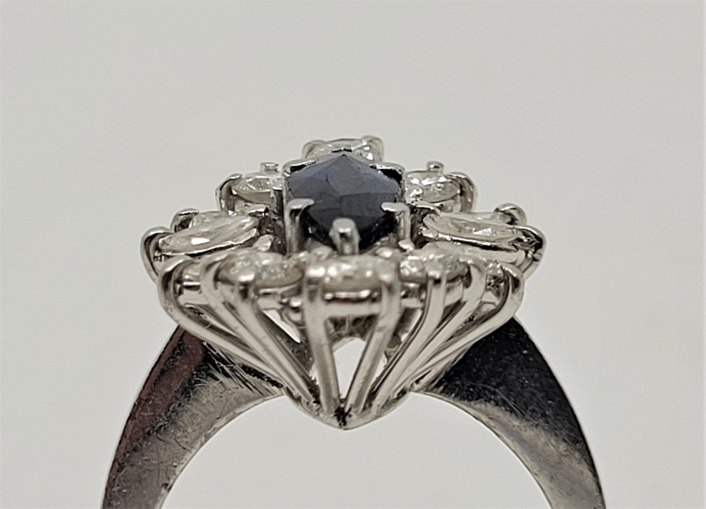 An 18ct. white gold, platinum, sapphire and diamond ring, set marquise cut blue sapphire to centre - Image 5 of 18