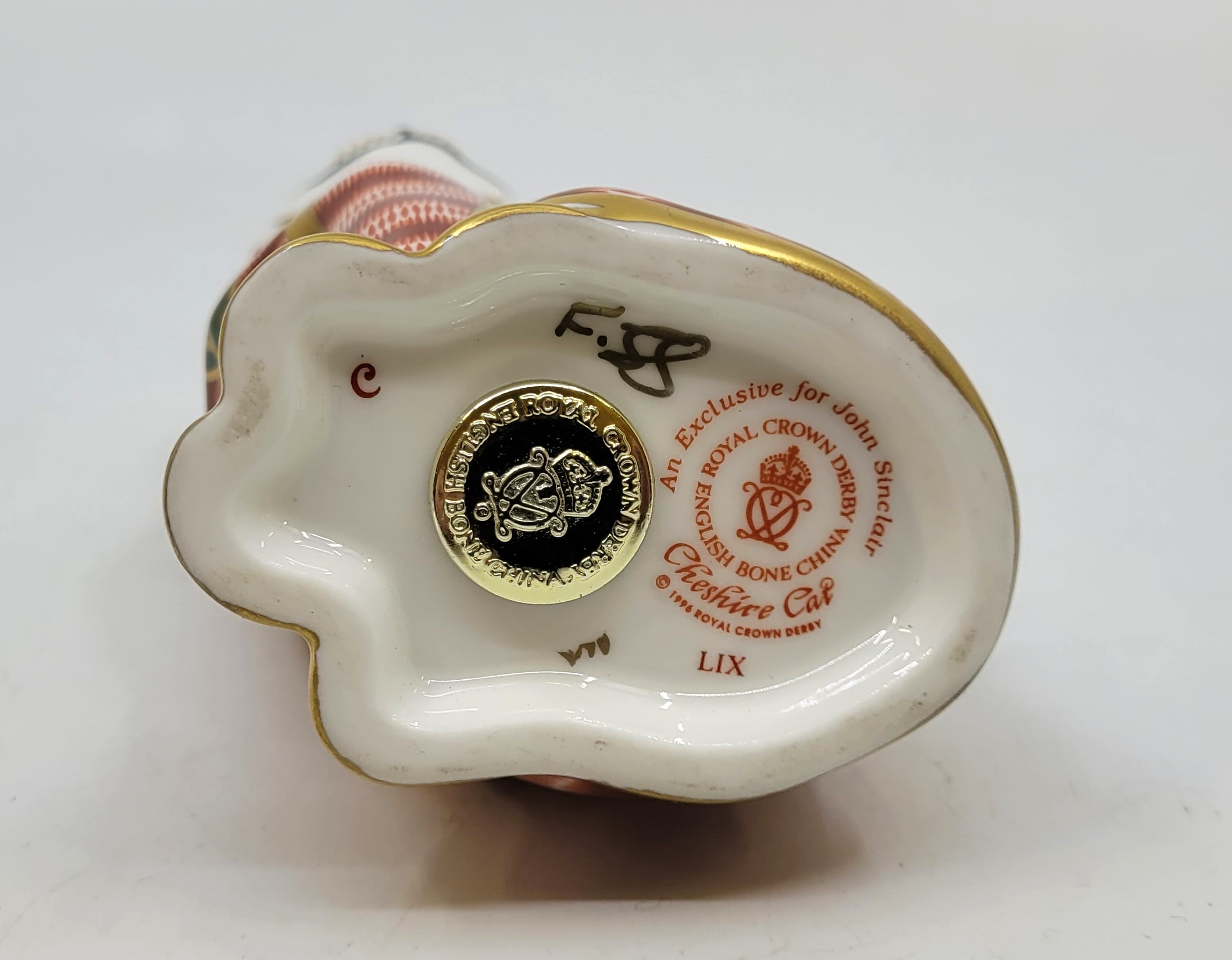 A Royal Crown Derby paperweight: Cheshire Cat, commissioned by John Sinclair, limited edition 137/ - Image 12 of 12