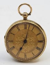 A Victorian 18ct. gold open face fob watch, key wind, having gold engine turned dial engraved