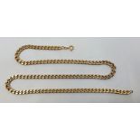 A 9ct. gold flat curb link chain, length 61.5cm. (51.9g)