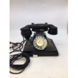 A vintage SIEMENS black bell telephone