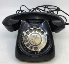 A vintage black bell telephone