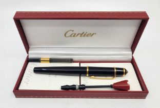 A Cartier "Diablo de Cartier" black composite fountain pen, with 18ct. gold nib, with paperwork in