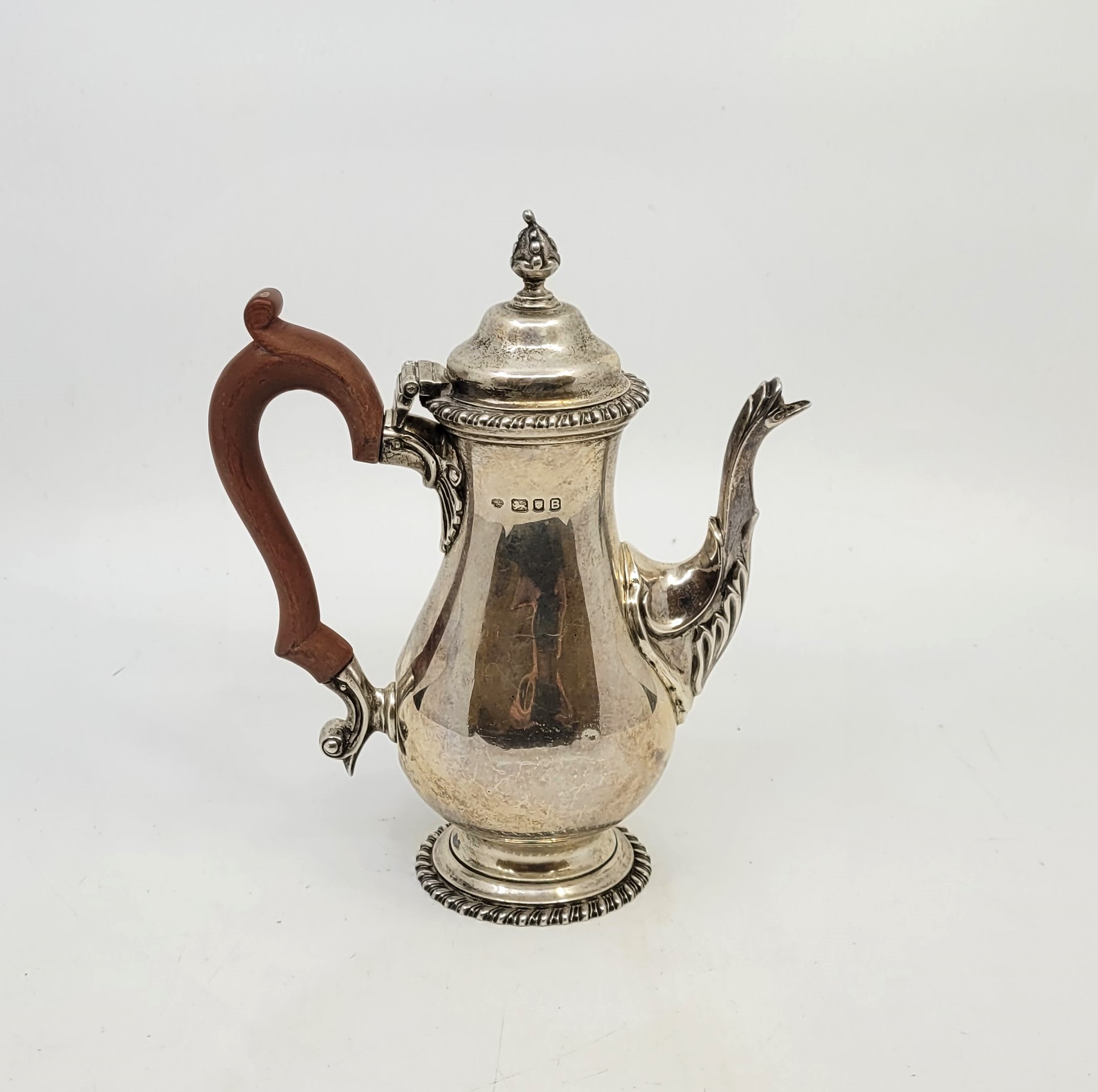 A silver baluster form bachelor's coffee pot, by Goldsmiths & Silversmith Co Ltd, London 1937,