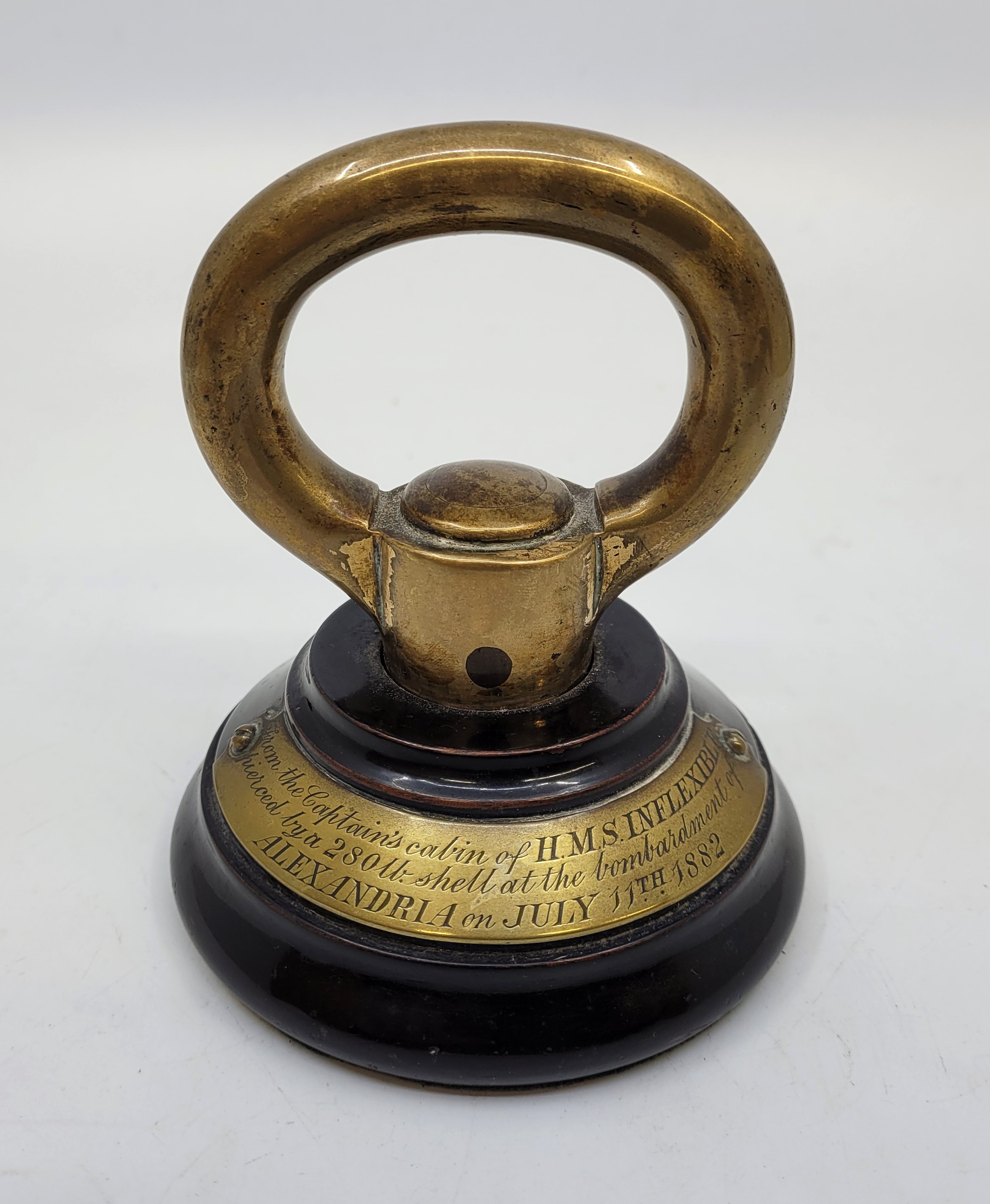 Royal Navy interest: A brass paperweight with applied inscribed plaque "From the Captain's Cabin - Image 2 of 3
