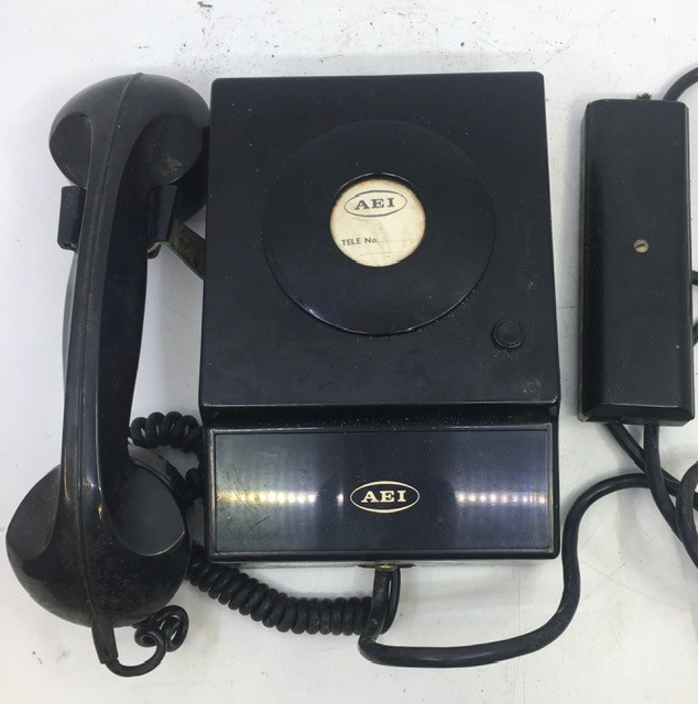 A vintage black telephone