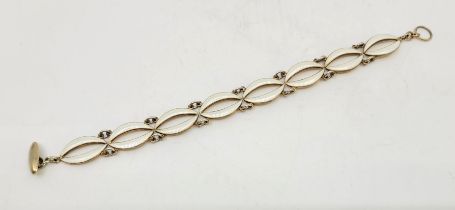 A Vomer Bahner sterling silver and white guilloche enamel bracelet, having pierced navette form
