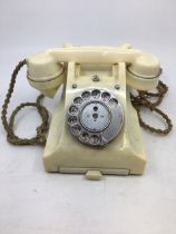 A vintage 1950s white bell telephone. (164-54), (312L)