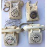 A collection of four white bell telephones (a/f)