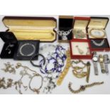 A collection of costume jewellery, to include: ladies' wrist watches, charm bracelets, necklaces et