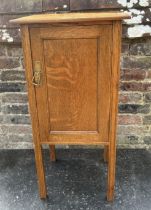 An early 20th cent oak Arts and crafts bedside cabinet