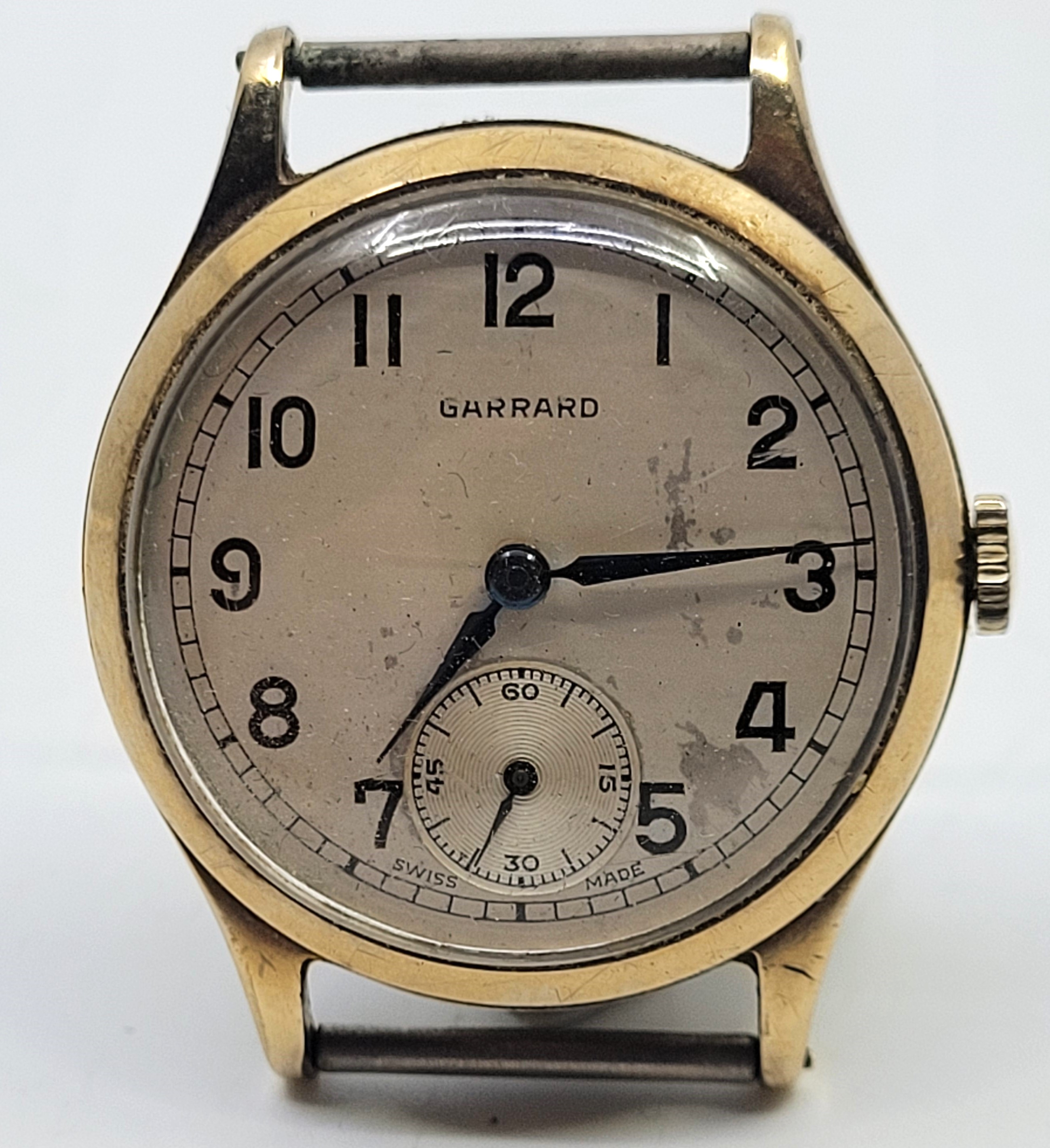 A Garrard 9ct. gold gentleman's presentation wrist watch, having signed circular Arabic numeral dial - Image 5 of 12