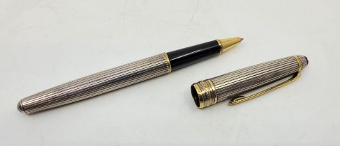 A Montblanc Meisterstuck "Solitaire" sterling silver ballpoint pen, striated with gold plated clip