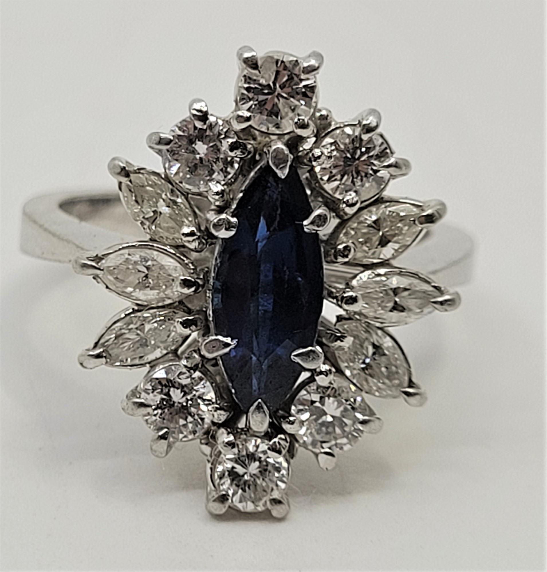 An 18ct. white gold, platinum, sapphire and diamond ring, set marquise cut blue sapphire to centre - Image 2 of 18