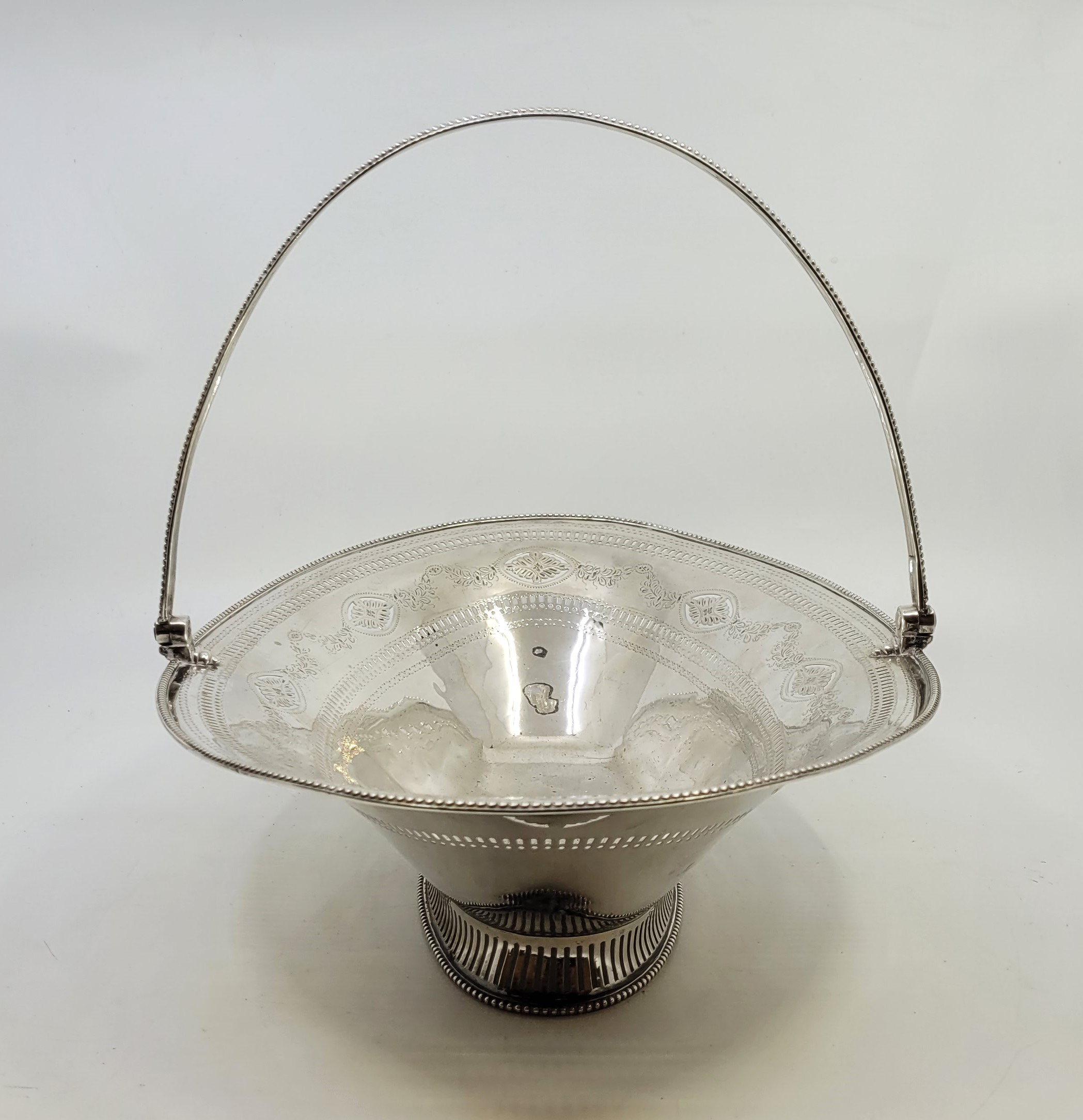 A George III silver swing handled basket, Robert Hennell I, London 1793, of ovoid form, the out - Image 16 of 21