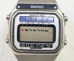 A Seiko A156-5040 Sports 100 solar powered LCD stainless steel wrist watch, c.1979, with Seiko