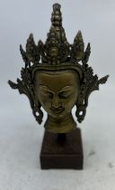 A large 19th cent  bronze head of Vajrasattva later mounted on stand