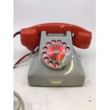 A vintage bell telephone (LM ERICSSON, A&T 614)