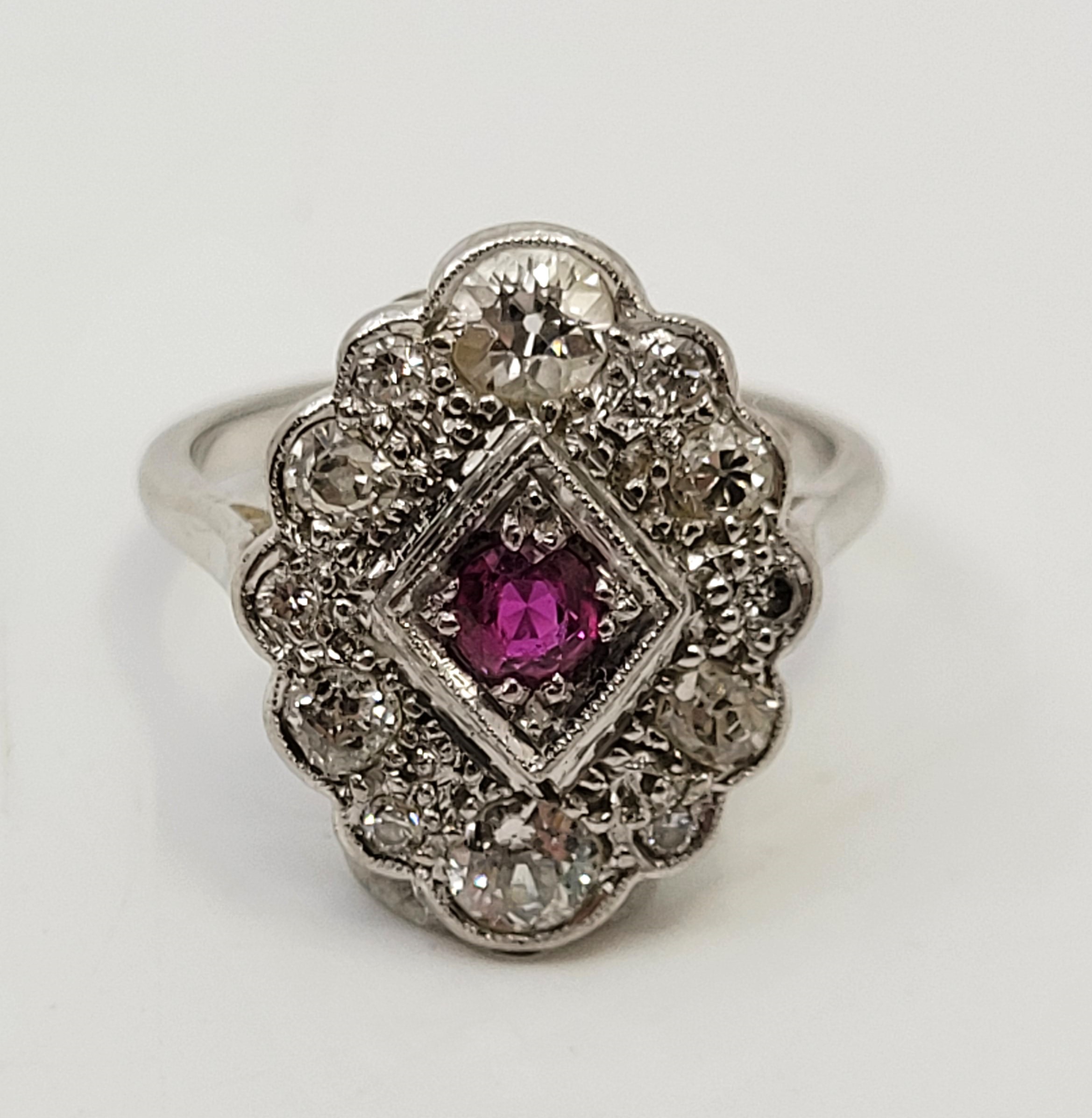 An 18ct. white gold, diamond and ruby ring, in the Art Deco style, having lobed oval mount set mixed - Image 2 of 12