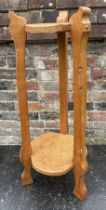 An arts and Crafts “Catman” carved Oak etagere
