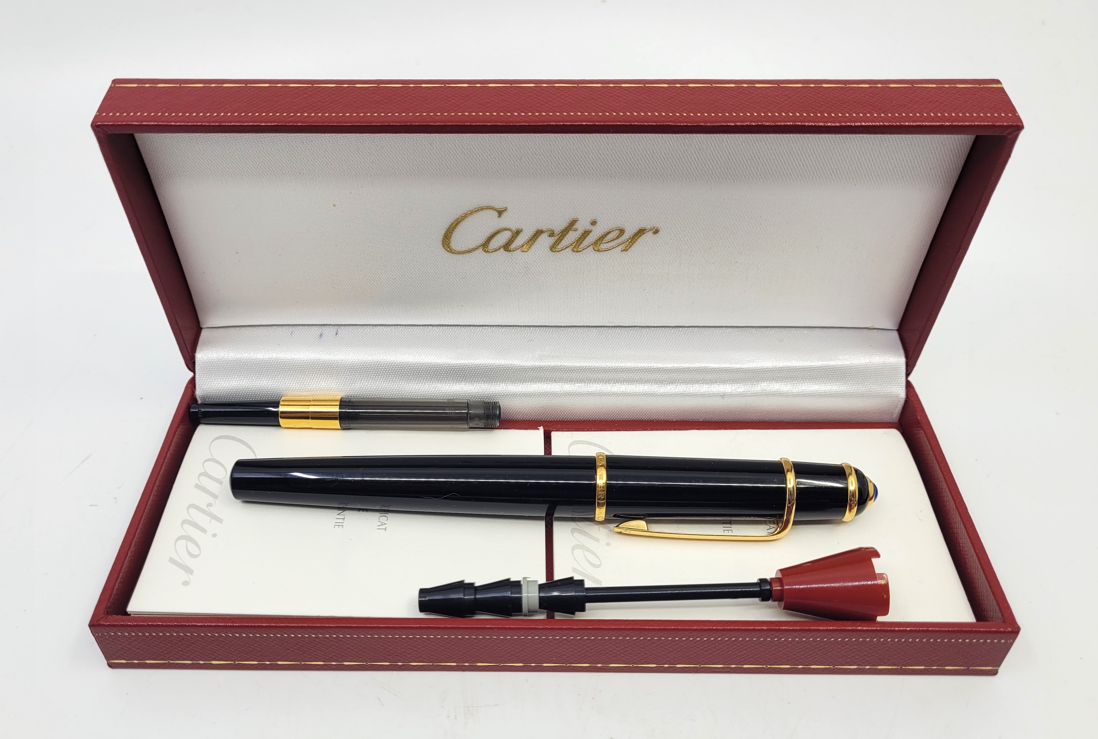 A Cartier "Diablo de Cartier" black composite fountain pen, with 18ct. gold nib, with paperwork in - Image 7 of 9