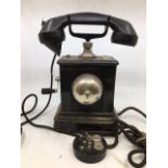 A vintage black telephone (JYDSK, TELEFON, AKTIESELSKAB)