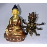 An interesting 18th 19th cent Chinese small bronze deity depicting Mahakala and a small gilt buddha