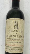 A Demi bottle of Latour 1961 Level good ,  cellar stored ,  some label discolouration.  Further