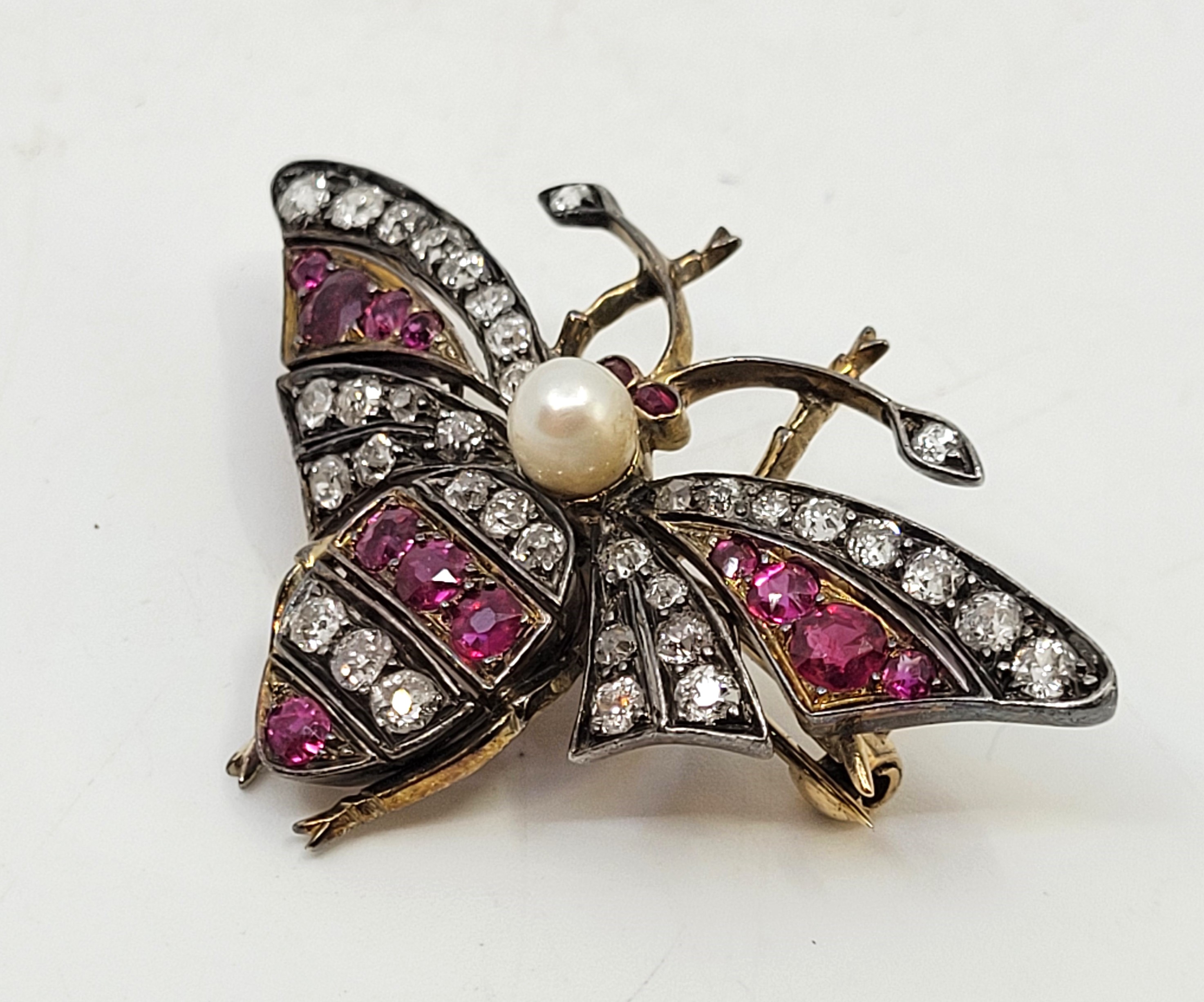An early 20th century precious mixed metal, diamond, ruby and pearl butterfly brooch, set central - Image 8 of 12