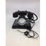 A vintage SIEMEN black bell telephone