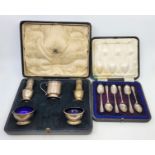 A five piece silver cruet set, by Edward Barnard & Sons Ltd, London 1916, comprising a pair of