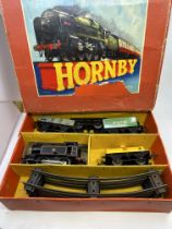 Hornby a cased Horny train set and a qty of carriages trains and other associated O gauge items