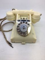 A vintage white bell telephone (164 - 54)