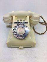 A vintage white "call exchange" telephone, (C.P.U.PL37, 254, No 164), (312L S53/3A)