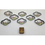 Eight Chinese quatrefoil cloisonne enamel dishes, each having different figural reserve, four with