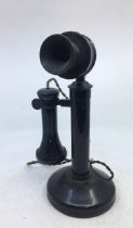 A vintage black telephone