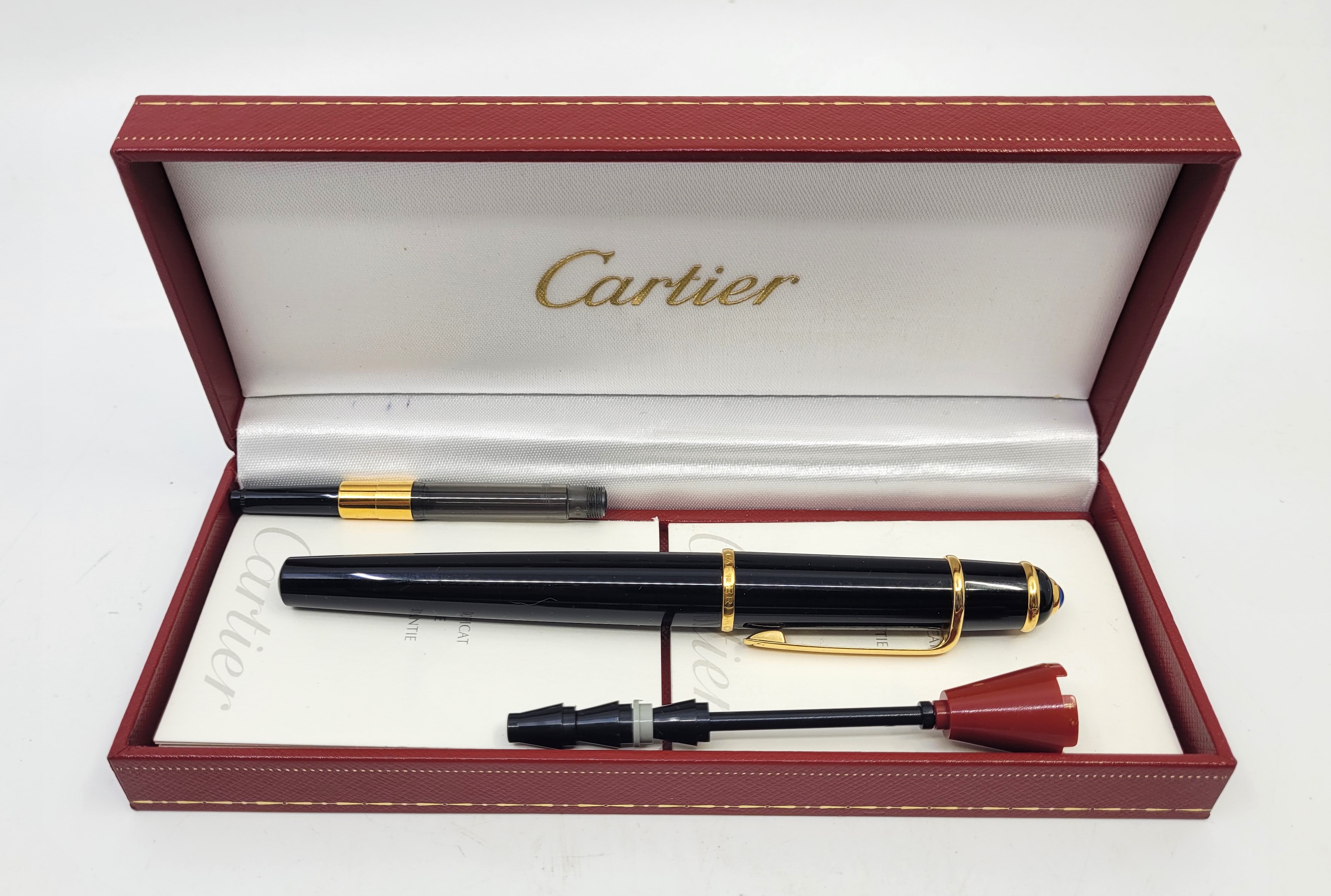 A Cartier "Diablo de Cartier" black composite fountain pen, with 18ct. gold nib, with paperwork in - Image 4 of 9