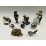 A collection of Royal Copenhagen porcelain figures of children and animals (9)