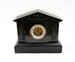 A late 19th/early 20th century slate mantel clock with figural design, with key. Untested, some