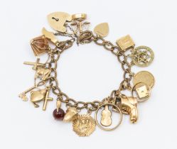 An unmarked 9ct gold charm bracelet, width approx 6mm,  length approx 190mm, testing as 9ct gold,