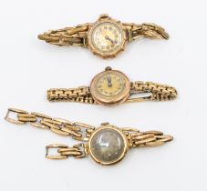 Two early 20th century 9ct gold cased wristwatches, including one with a 9ct gold strap the others